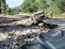 A highway washout photographed as BCARES members surveyed Lyons, Colorado, between Estes Park and Longmont. Colorado SM Jack Ciaccia, WMØG, says the town was cut off for a couple of days, and communication between Lyons and the Boulder EOC was primarily through the one ham resident there, Paul Burge, KØDJV. [KB9TTI photo]